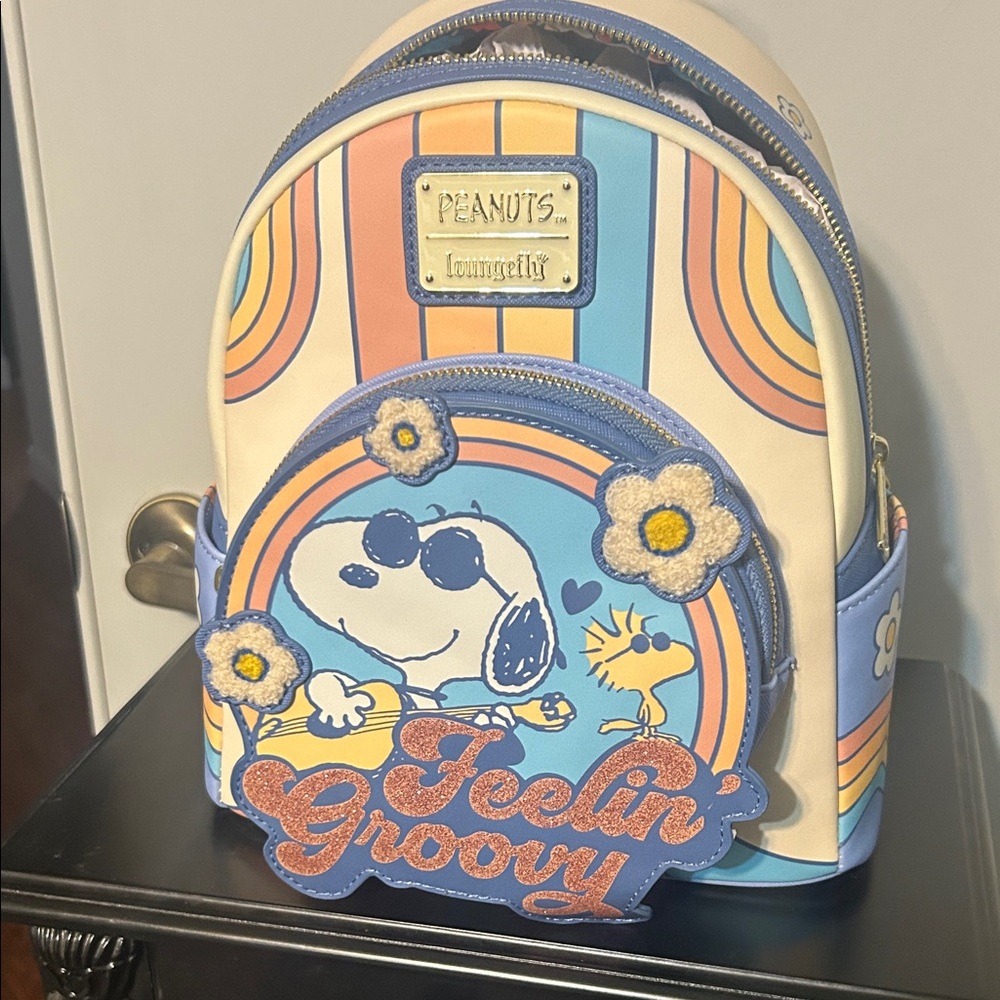 Loungefly Peanuts Mini Backpack in Pastel Blue, Peach, Cream